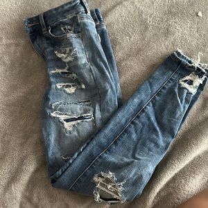 ripped blue jeans from american eagle 00